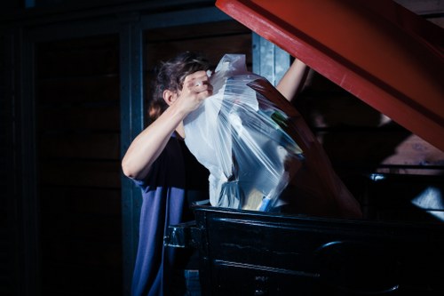 Clearance workers sorting household items